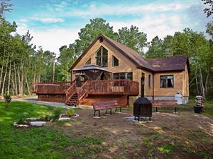 chalet avec spa, sauna ou bain tourbillon  Charlevoix