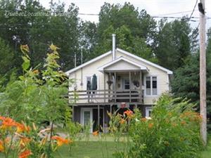 chalet avec spa, sauna ou bain tourbillon  Mauricie