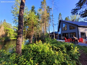 Cottage rental | Stunning family cottage on the Mékinac River &  SPA